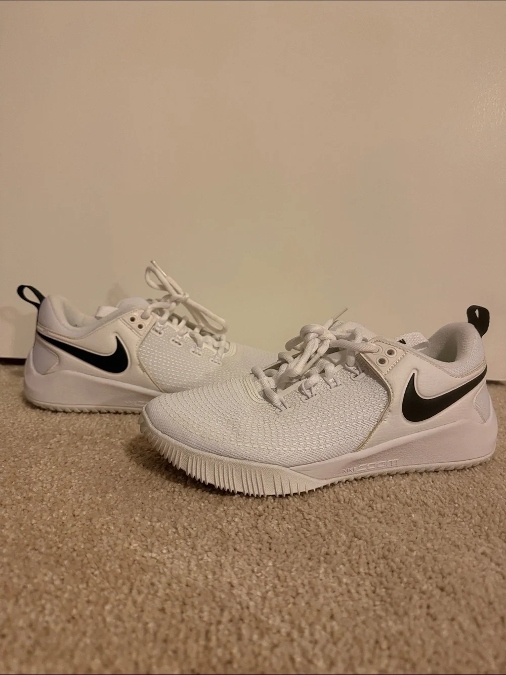 Nike Women's White Sneakers with Black Swoosh